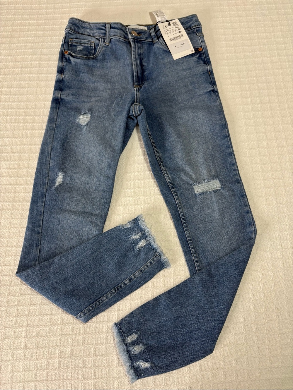 Zara Junior’s Distressed Mid-Blue Skinny Jeans